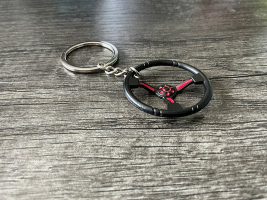 Quick release steering wheel keychain