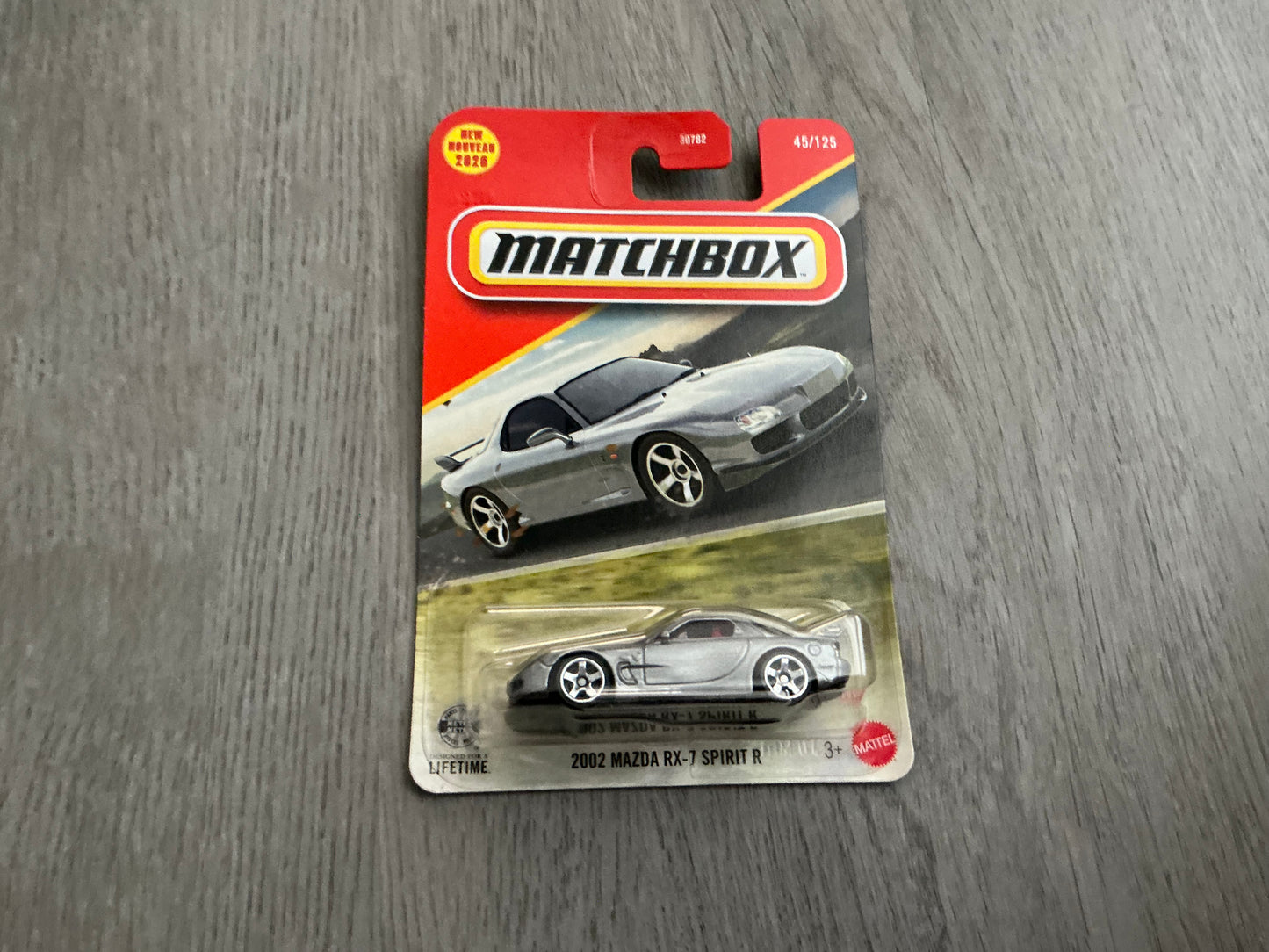 Matchbox 1:64 scale die-cast model of a 2002 Mazda RX-7 Spirit R