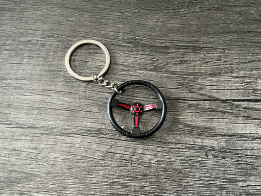 Quick release steering wheel keychain